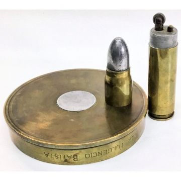 Ashtray and lighther, maybe, made of original bullets.