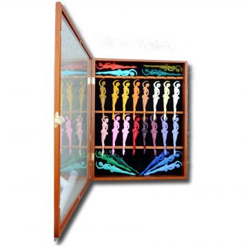Framed in a box, 26 colors and shades of Tropicana swizzle sticks